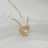 A large heart-shaped pendant with a hollow texture and a small heart embedded inside has a golden texture and a romantic atmosphere Application Scenario